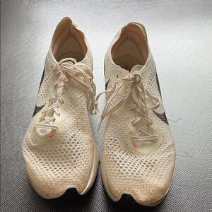 Nike Vaporfly size 9 running shoes.